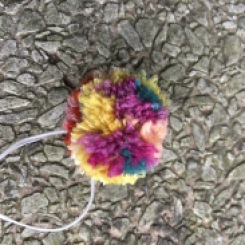 One side of multicolored pompom