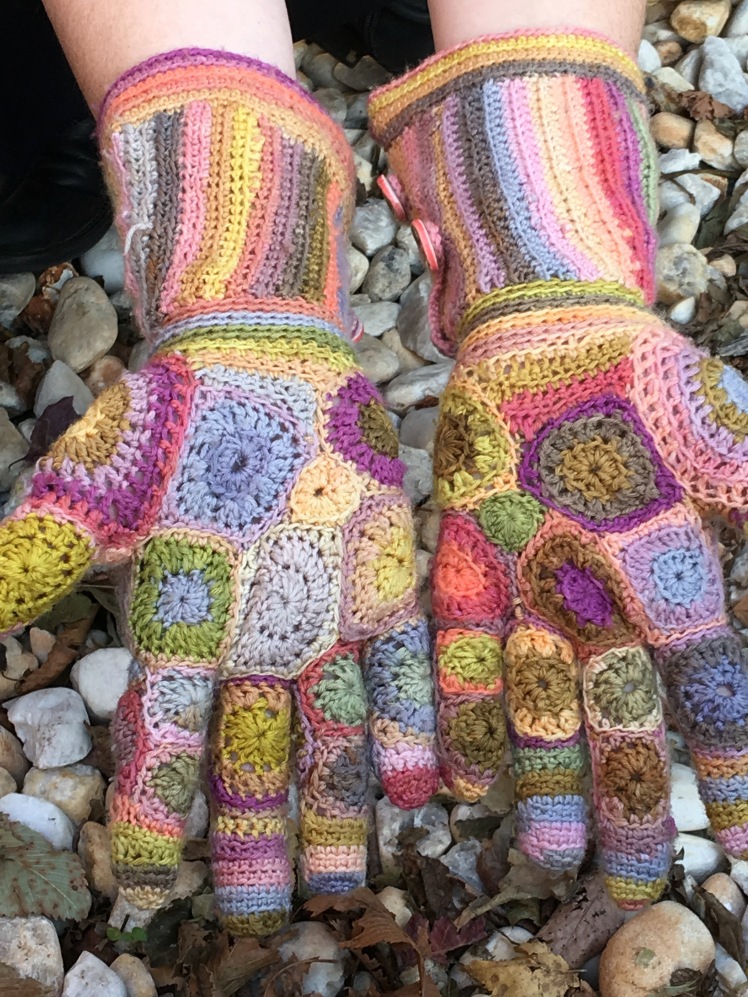 Patchwork crochet gloves, palms up