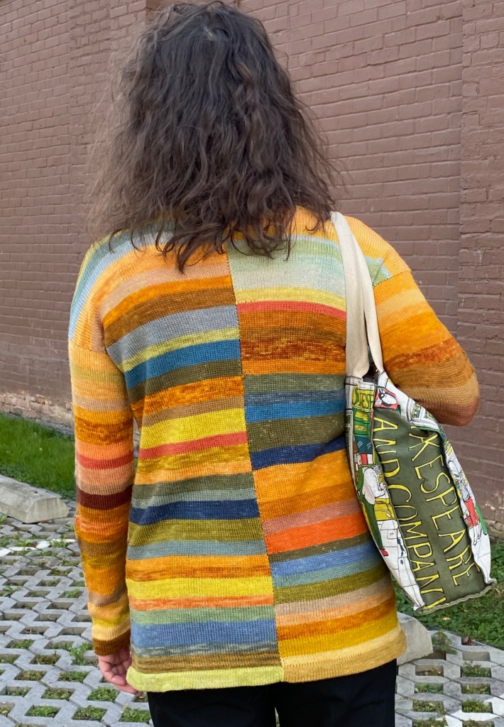 Rear view of paneled machine-knit pullover