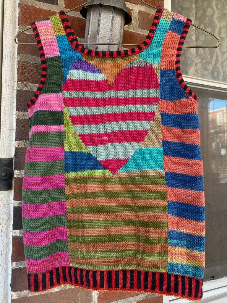 Machine-knit intarsia top using self-striping cotton yarn. Heart shape of intarsia knitted by carefully following a hand-knitting chart